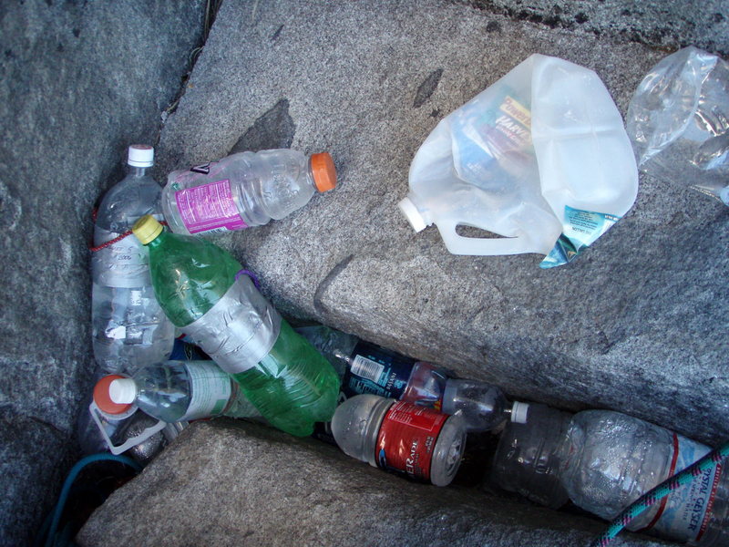 Camp 6 - weak to leave trash on a wall, but easy to grab it if you're the next party through.  We took everything in the photo, leaving only a few water bottles that had been dated in Sharpie w/in the last two weeks.