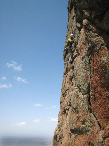 Heading up the steep face of pitch 5 after doing the leftward traverse from the belay.