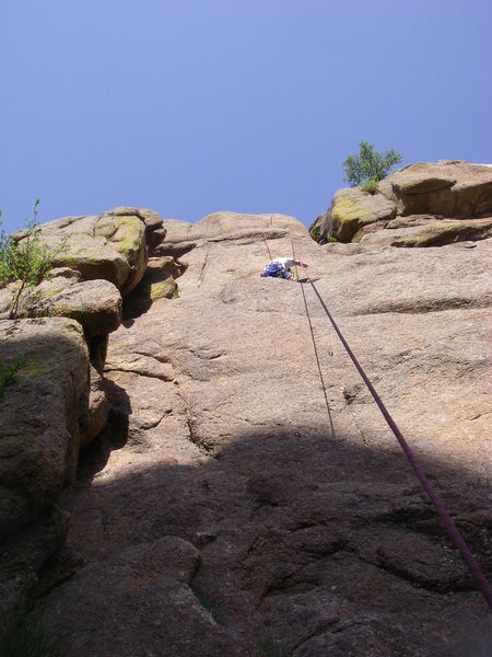 Dave above the mantels, just below the bolted, blank bulge.