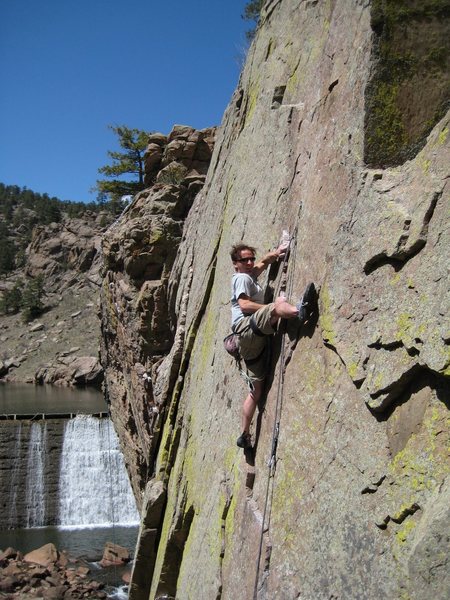 Stemming through the upper crux. Wee bit harder for short folks.