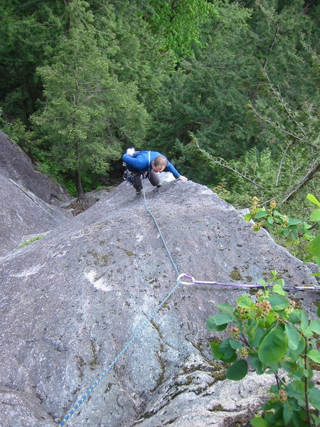 Brad almost done Quickdraw.  The combination of body english, arete pinching and smearing required by this route is evident.