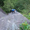 Brad almost done Quickdraw.  The combination of body english, arete pinching and smearing required by this route is evident.