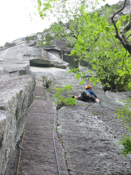 Brad leading the second pitch of Borderline.  The 11c crux is visible above, but Brad is traversing over to approach Blazing Saddles.  Done this way, the pitch is 5.9, although before making the traverse, it looks like it's going to be harder.