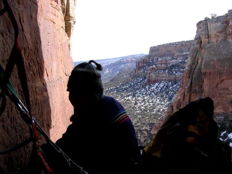 Hanging out 1 sweet pitch below the summit.  Winter time in the monument.