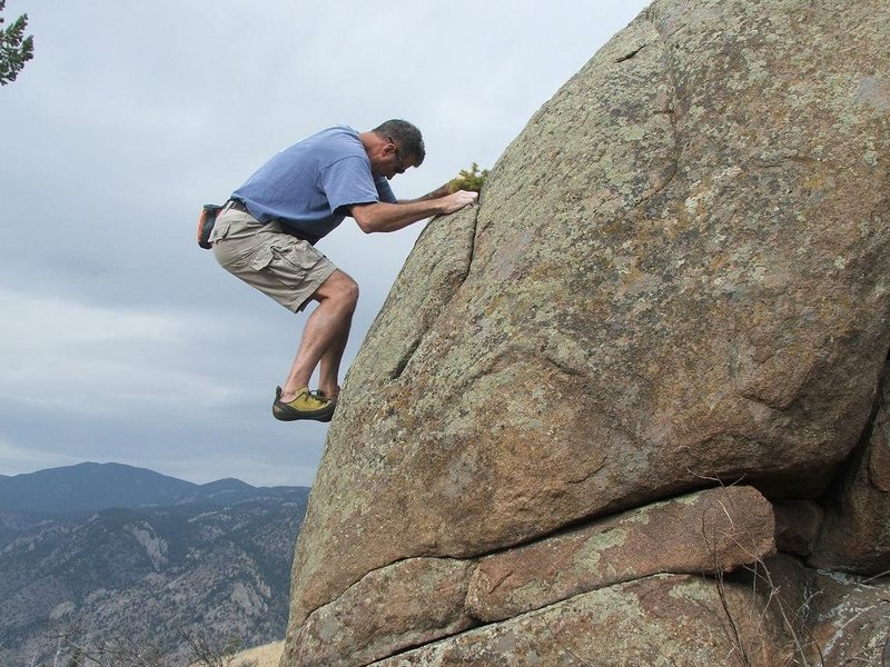 Al Simons bouldering in a secluded area in Sullivan Gulch.  