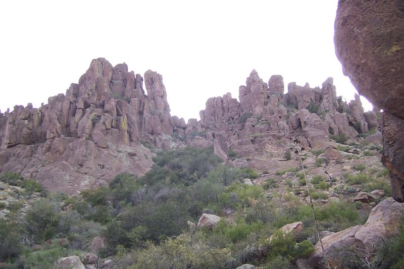 Here's a picture of zonerland as taken from the trail standing just before the large boulder. The maze of rock above contains tone of the bell and other established lines both trad and sport, keep going uphill and you will encounter a confusing pathway of rock with many intermittent climbs.