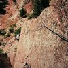 Jason Haas follows 'The Throne' (11b/c)on Shirt Tail Peak in Eldo. Photo by Tony Bubb, 5/08.