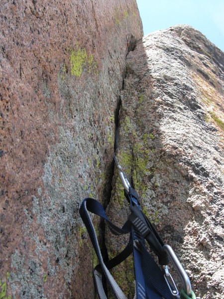 Looking up the thin crack before I set my next ladder on the nut above.