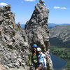 Our victory shot. The notch is visible in the background. The route ascends parallel to the northern skyline aspect of the thumb in the shot displaced to the east.