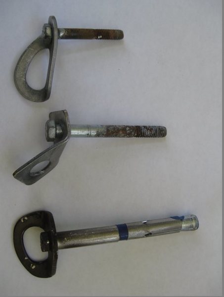 At top, two of the old bolts from Your Mother, and at bottom, the 1/2-inch by 4 3/4 bolts used to replace them.