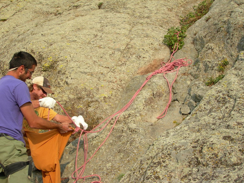 Cooper and Dubois recovering their rope from a poison ivy patch below Bloodguard.