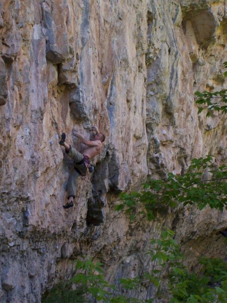 Ian bouldering out the bottom crux.