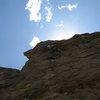 MaryKay on the Unknown Route to the Left of Rip Off Ranger. This climb is basically the highest on the rock, and on that account, it's one of the best. Decently bolted, nice moves, and more climbing.