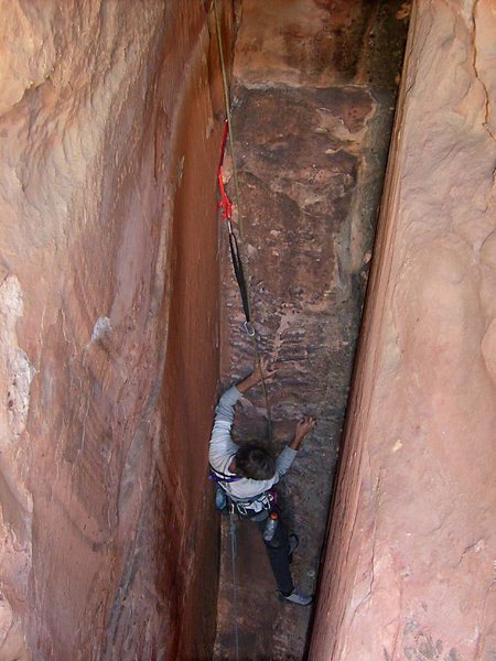 Looking down the initial chimney from the ledge near the lip of the first overhang.