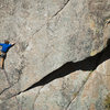 Jarrett Tishmack making the long reach out of the L-diagonalling seam on Winds of Fortune (photo by Dan Gambino).