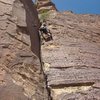 The crux section of the first pitch.