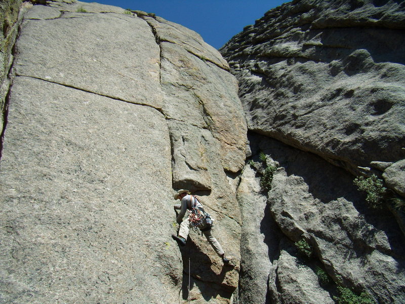 Bill Duncan leading the super fine 5.9 offwidth pitch on Hot Licks (it's wider than it looks here).  The Bookend.  Lumpy Ridge- June 29th 2008.