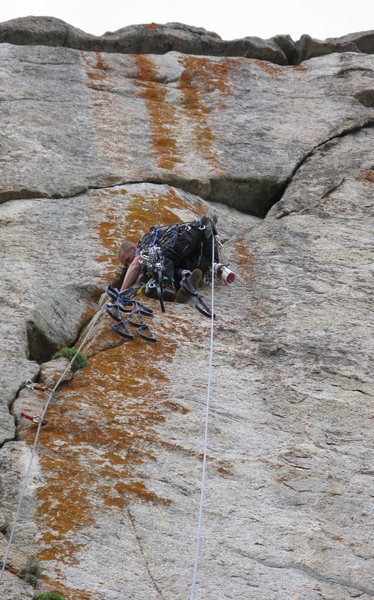 Working on pulling some gear to make upward progress. Getting to the really colorful section of the wall!