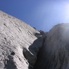 Hoskins out of the chimney and leaning into the lieback - P2: EllsWorth McQuarry Route<br>
