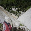 Hoskins getting comfortable at the belay, nice shoes! - P3: EllsWorth McQuarry Route<br>
