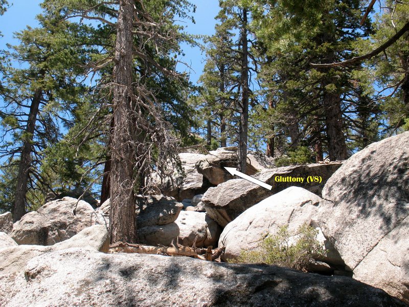 The sharp arete of Gluttony (V8) is a helpful landmark to locate the stream crossing to the Undiscovered Country, Tramway