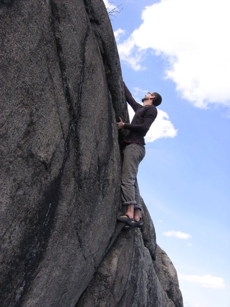 Chris Deulen contemplating yet another slightly desperate slabby top out. 