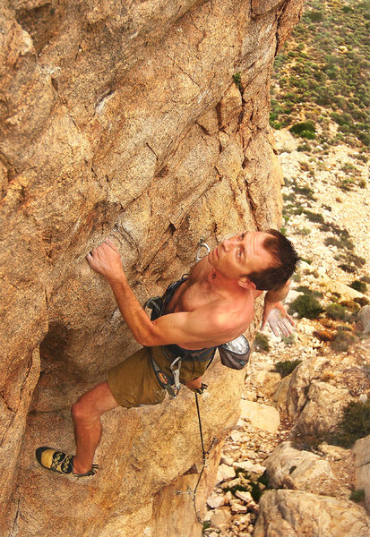 Tai Devore redpointing one of his routes in Pine Creek.