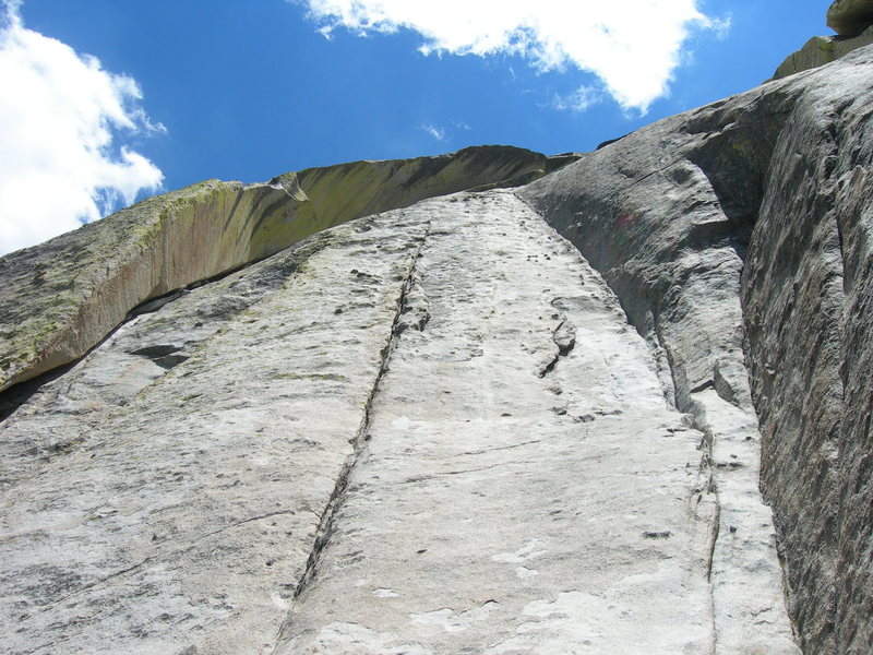 First pitch is the curving 5.7 crack on the right.