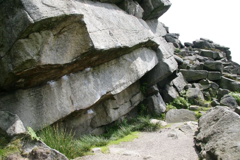 A close up of the starting overhang of Remergence, 5.12a