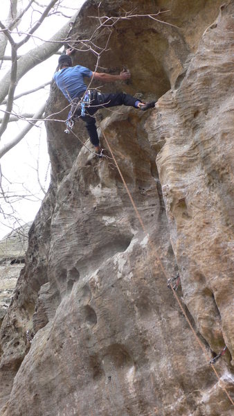 Nearing the anchor on what was probably the first trad onsight of this route (3/26/06). photo by H.