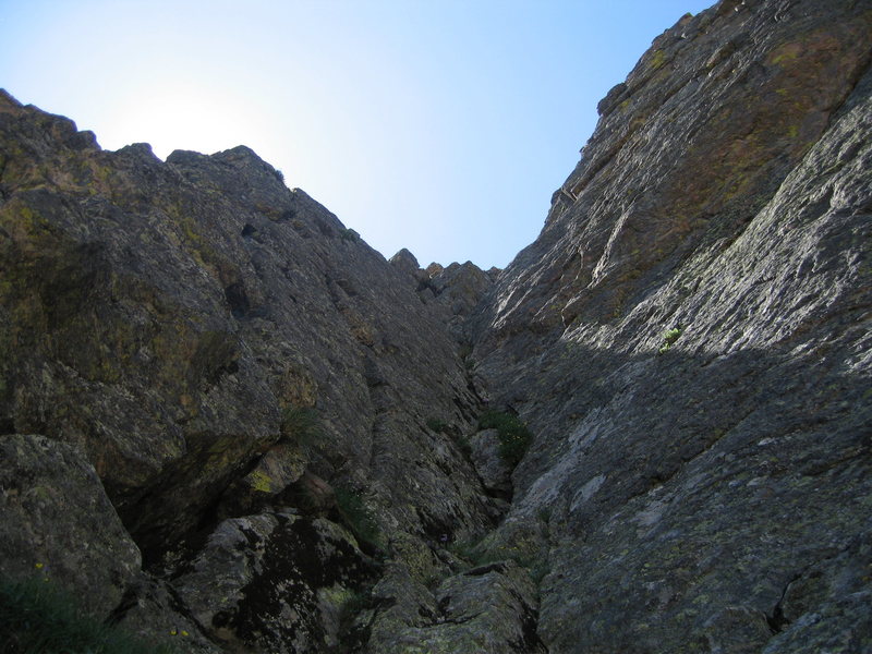 The final pitch of the standard route on the first buttress is shown. Excellent (easy and protected) dihedral climbing continues. This pitch is quite nice for the simple grade (and can be made harder with excellent gear).