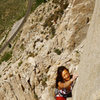 Elizabeth passing around the crux on p-2, 'West Face'