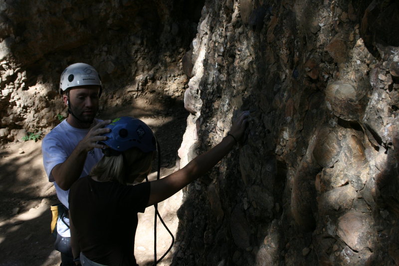 My husband checking my helmet before starting to climb