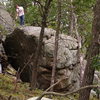 Middle of steep face.  You can see the key crimper about 3ft. below Seth in picture,