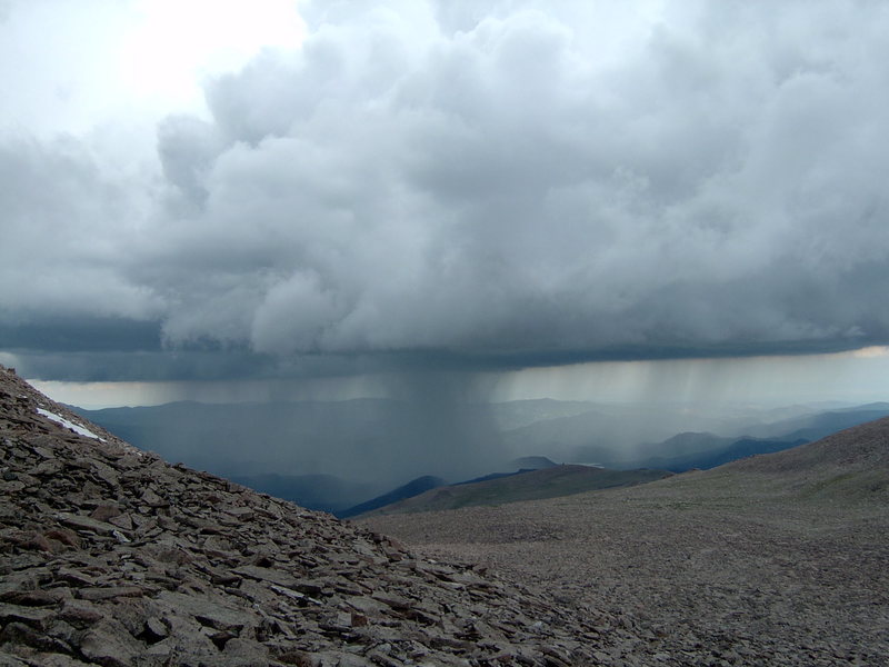 Watching a storm over Estes from the Boulderfield, 2004.