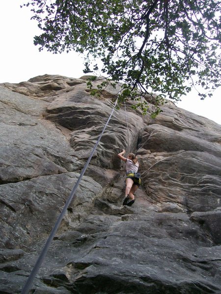 Jenny At the Small overhang with what I think may be the first bolt right above her head.