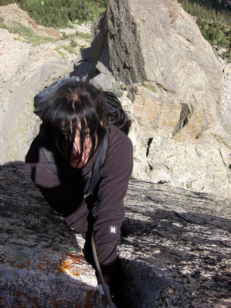 Pebby at the top of the hand crack, pitch 5.