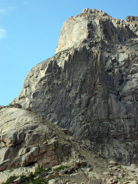 This photo shows the entire northeast ridge as seen from the east end of Solitude Lake. The final pitch takes the left of the twin aretes.