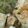 Look Ma, no helmet!  A rare pic of John Sherman bouldering w/o a helmet.  lucky this highball problem has a "Happy Ending".