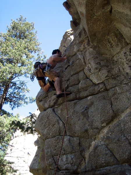 Stephen Sandstrom climbing the crux of Unfamiliar Strangers.