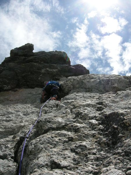 The final crack heading toward the summit (protects well with nuts). Don't remember seeing the piton referenced in the route description.