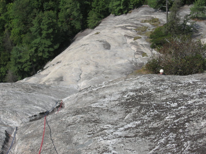 The look down half way up P4 to the belay at the top of P3 and beyond...