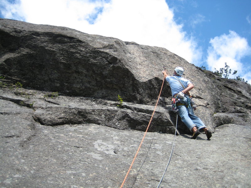 Evan on the crux, the 5.10a second pitch roof. 