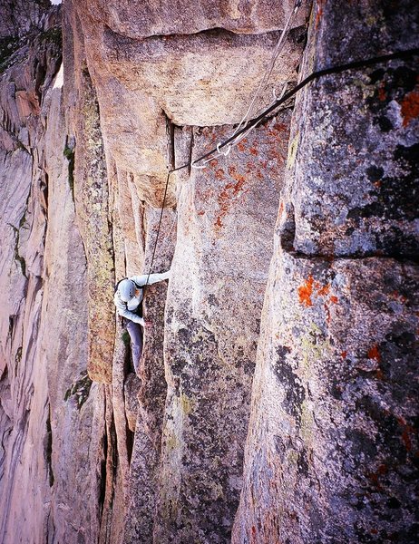 Kat A. approaches the sandbagged "10a" crux on the Red Wall. Photo by Tony Bubb, 7/08.