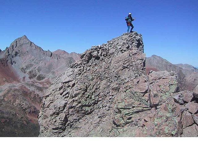 Jennifer Roach on the summit, one of her last 13ers.