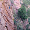 Erik on the distinctive roof, using impeccable technique, coasts through to the top.