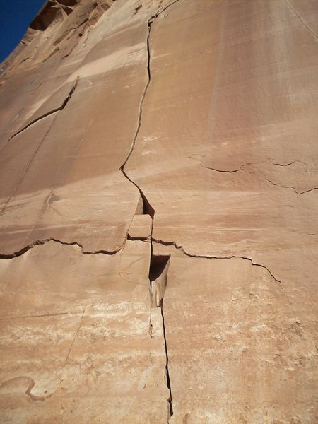 View from base of climb. Watch out for loose rocks in the hole before it goes left and also right below the anchors. 