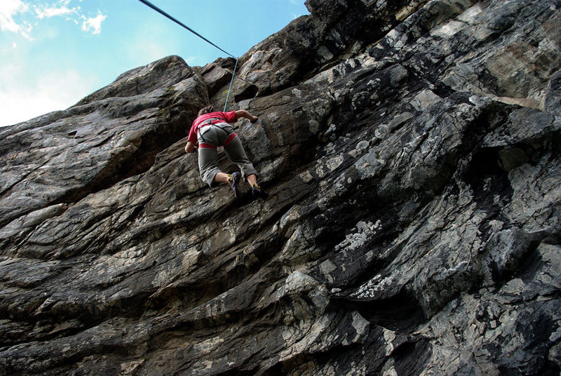 This is the right of the middle two climbs - 8 feet left of the sport route. Not a huge fan. We had a little rain, it was an easy start (5.5?), but the one-move-wonder holds (5.7 one move?) were a bit muddy. Oh well.