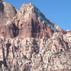 The Cactus Flower Tower north face route from the Oak Creek trail.  The Blood Wall approach comes in from the right(west) and joins near the top of the red band.