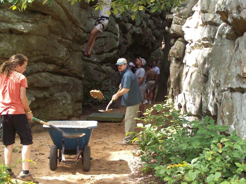 Even old guys helped move some sand.